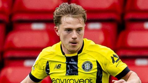 James Daly in action for Harrogate Town