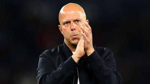 Liverpool boss Arne Slot looks glum after the loss to PSG