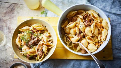 Two bowls of sausage, fennel and pecorino conchiglie.