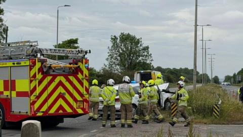The scene of a crash with police and fire on the scene