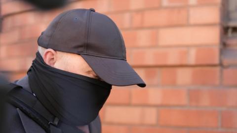 Robert Bush in mask