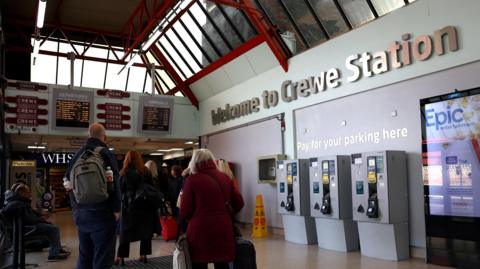 People waiting at Crewe Station