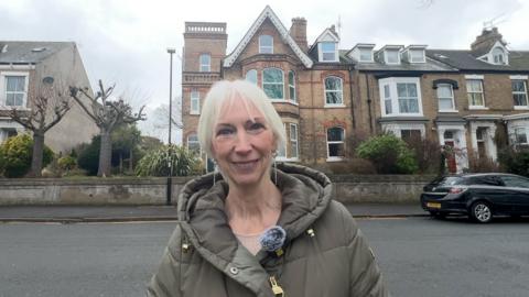 Sue Taylor outside her home in Hornsea