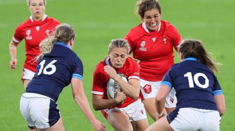 Wales' Hannah Jones takes a crash-ball against Scotland during the Pool A 2021 Rugby World Cup match at Northland Events Centre on 9 October 2022, in Whangarei, New Zealand.