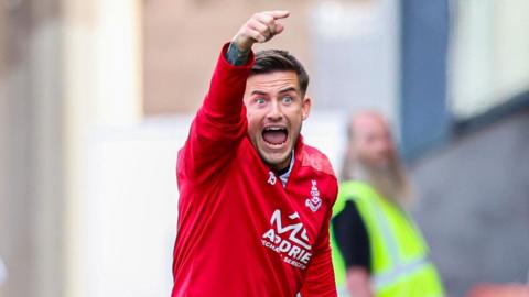 Rhys McCabe on the touchline with Airdrieonians