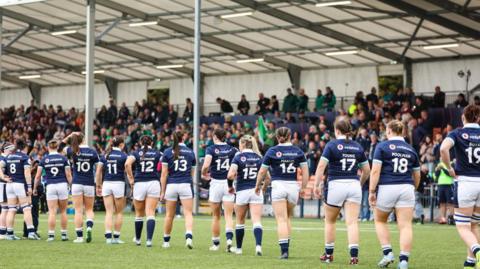 The Scotland women's team walks out onto the pitch before the Women's Six Nations match with Ireland in April