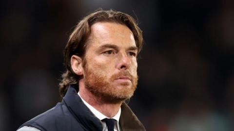 Burnley boss Scott Parker looks on from the touchline.