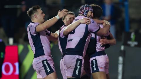 Cardiff players celebrate Ben Thomas try