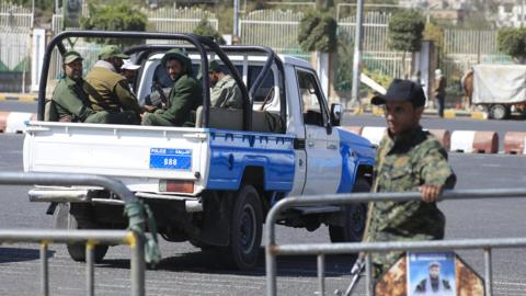 Houthi forces travel on a pick-up truck while on patrol in Sanaa, Yemen (25 January 2025)