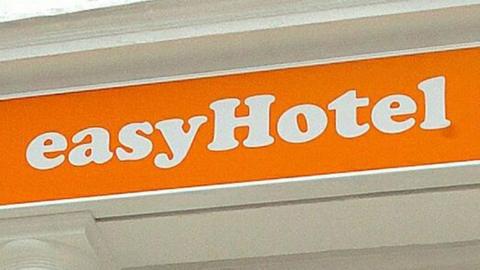 Generic orange easyHotel sign