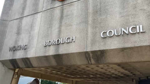 A close up image of the 'Woking Borough Council' lettering on the civic offices.