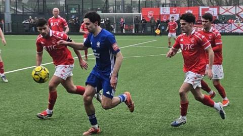 Action from Jersey Bulls v Hassocks