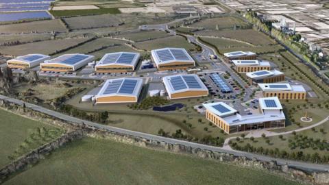 An artificially generated 3D rendering of the proposed complex. It sits on a plot of land to the left of a road. The rendering shows 11 modern buildings with solar-panelled roofs. 