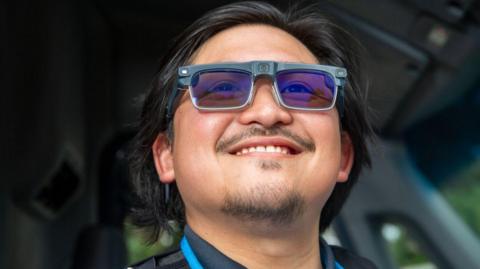 An Amazon delivery driver wearing the tech giant's prototype smart glasses.