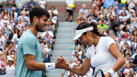 Carlos Alcaraz and Emma Raducanu celebrate during the US Open