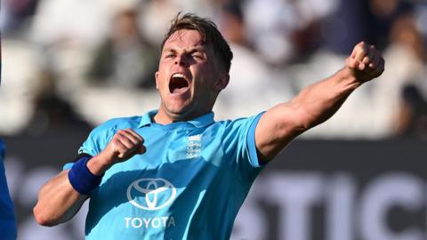 England bowler Sam Curran celebrates taking a wicket