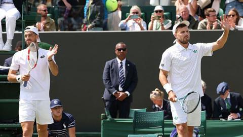 Julian Cash and Lloyd Glasspool in action at Wimbledon