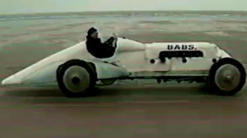 The rebuilt record-breaking car BABS being driven on Pendine Sands
