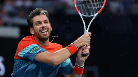 Cameron Norrie celebrates