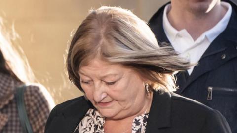 Jacqueline Higson, with her her bowed, outside Bradford Crown Court