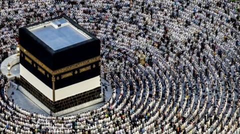 Muslim pilgrims pray around the Kaaba, Islam's holiest shrine