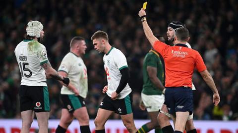 Jack Crowley shown yellow card