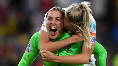 Mary Earps and Leah Williamson celebrate after England's third goal during their Euro 2022 semi-final against Sweden