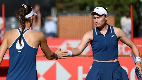 Olivia Nicholls (right) and partner Tereza Mihalikova