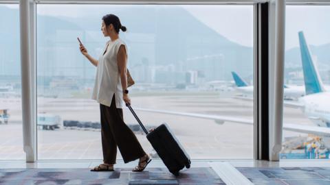 Woman at airport terminal