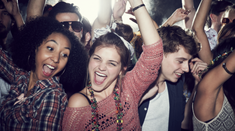 Young people enjoying music