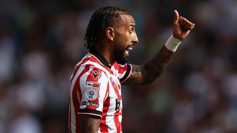 Stoke City's Sorba Thomas gives fans the thumbs up after scoring