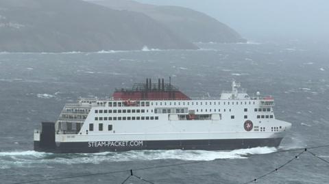 The Manxman, a large white ferry, as it sails across choppy waters in Douglas Bay.