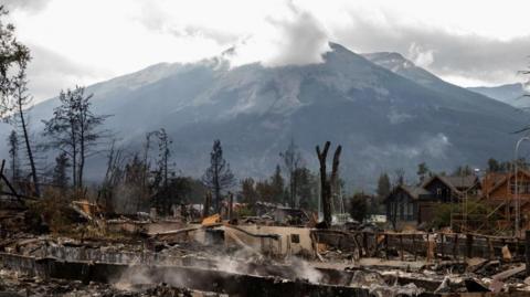 A devastated residential block in Jasper, Alta., Canada is shown during a tour on Friday, July 26