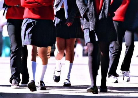 Students wearing school uniforms 