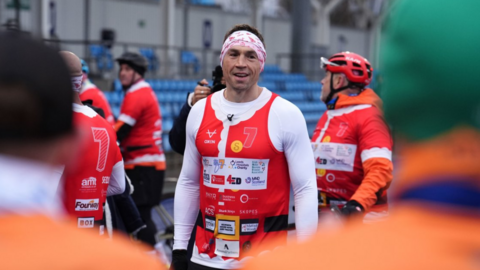 Sinfield smiles on the last day of his marathon run