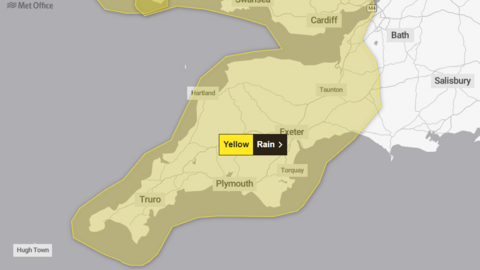 A map showing Devon and Cornwall outlined in yellow with a label showing a Yellow Rain warning. 