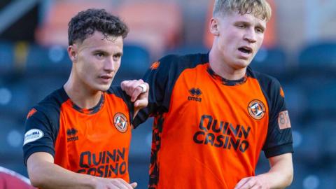 Dundee United's Dylan Tait and Zac Sapsford celebrate