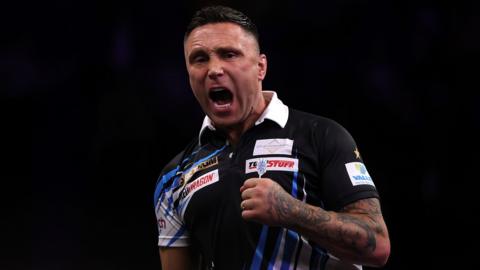 Gerwyn Price clenches fist and roars 
