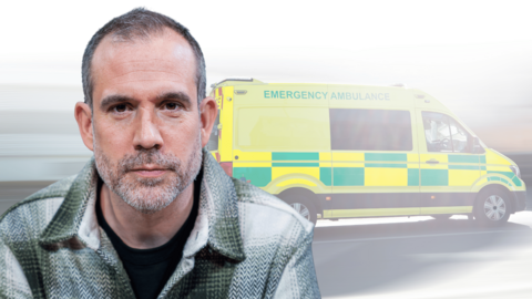 image shows dr xand in front of an ambulance
