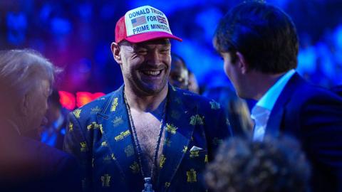 Tyson Fury at the UFC's White House event in a baseball cap that carries the message 'Donald Trump for Prime Minister'