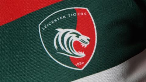Badge on a Leicester Tigers shirt