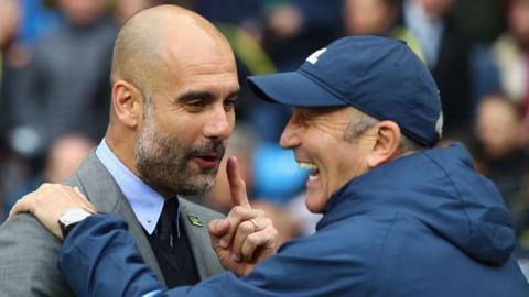 An image of Pep Guardiola and Tony Pulis laughing and smiling to each other when Manchester City played West Brom in 2017