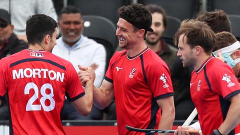 Phil Roper celebrates after scoring for Great Britain