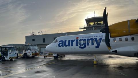 Aurigny plane stationary at Guernsey Airport 