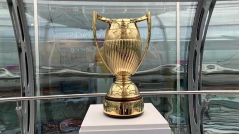 The Women's Rugby World Cup trophy at the top of Brighton i360