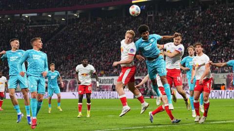 Xaver Schlager and Bernardo battle for the ball.