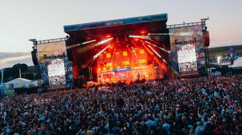 A crowd of thousands of people watch The Reytons perform at Y Not Festival 2026