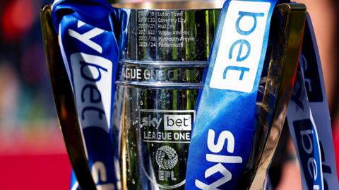 A general view of the EFL League One trophy with blue and white ribbons attached