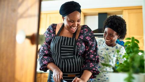 Mother and child cooking