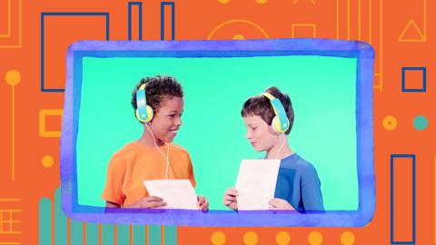 image of two boys listening with headphones on